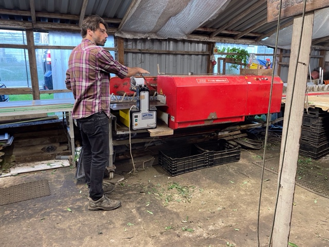 Ben in the sorting and packing shed.