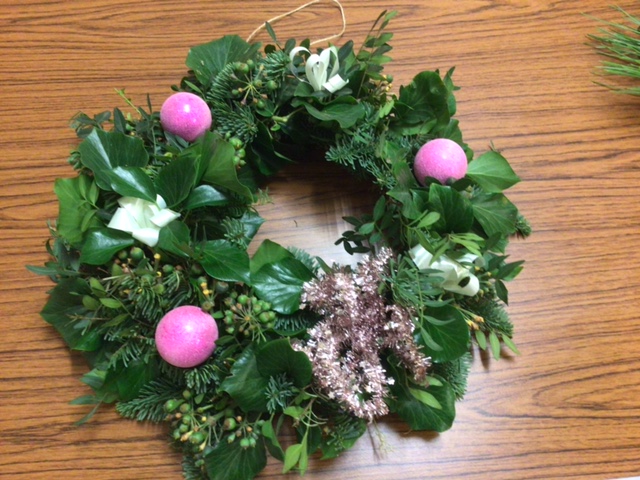 Wreath made with garden foliage.